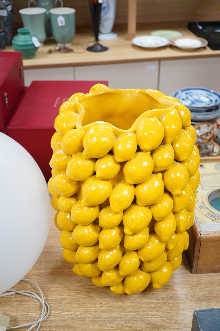 A large yellow glazed ceramic ‘lemons’ vase, 45cm
